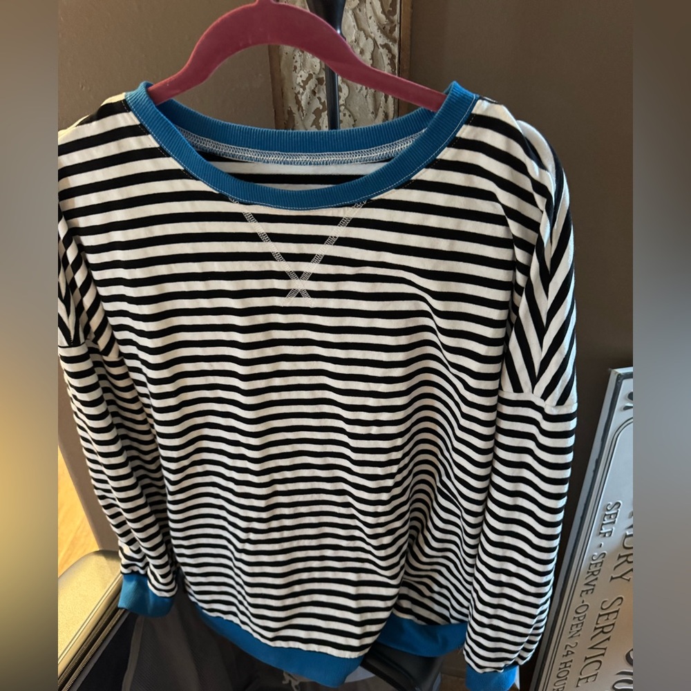 Striped Black and White Sweater with Blue Accents
